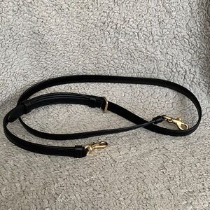 Black color gold tone hardware 41-46” strap for bag in great condition
